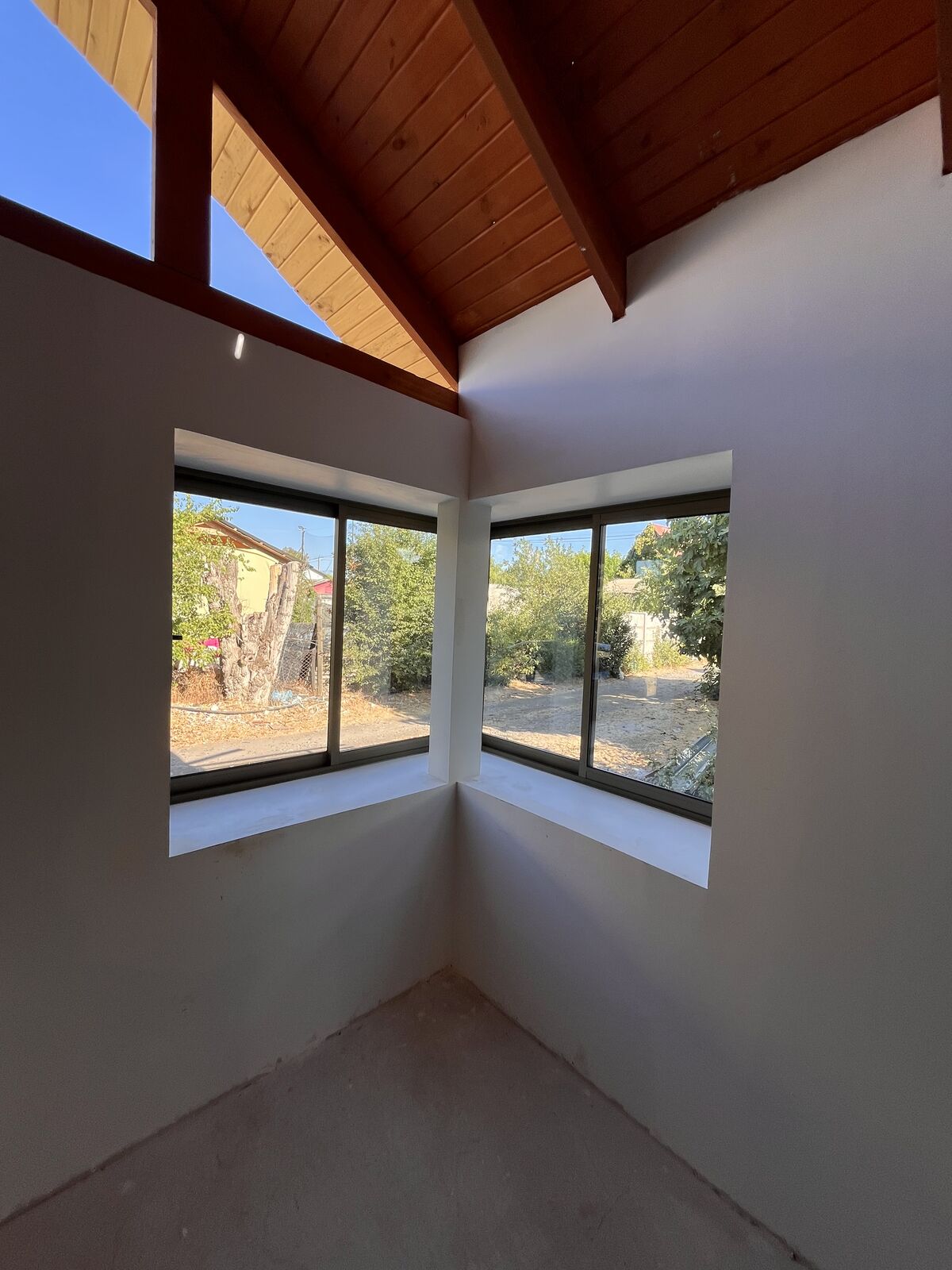 Bow window con ventanas de termopanel — Vivienda de 97 m² en Talca, Talca